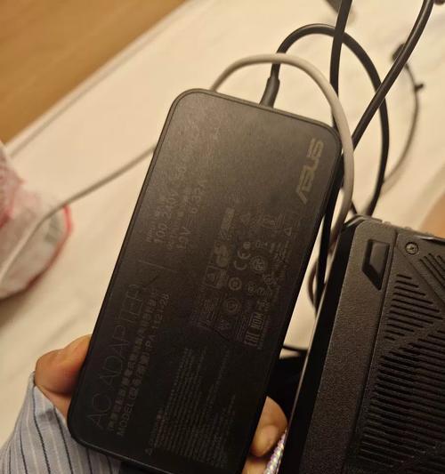 华硕a556u充电器的尺寸是多少毫米？  第3张